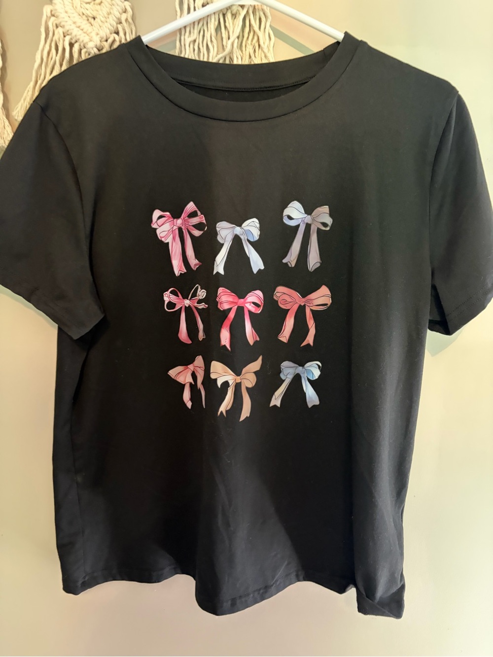 Women Black Short Sleeve Tee with Bow Graphic